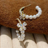 EUR418 Crystals butterfly and pearls earring in Ivory