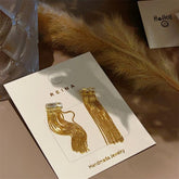 EUR419 Tassels earrings in Gold