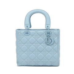 Pale blue leather look quilted top handle bags with long strap