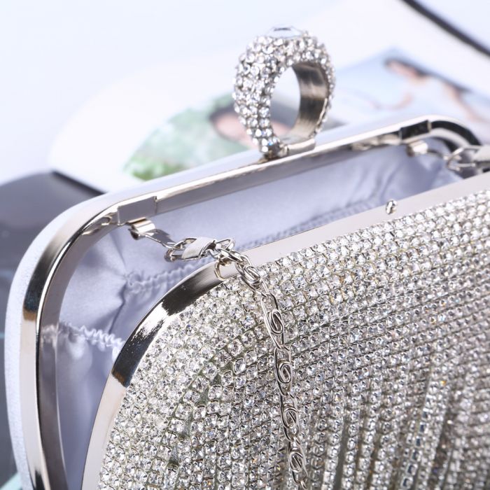 Tassels crystal clutch bag with ring detail in Silver