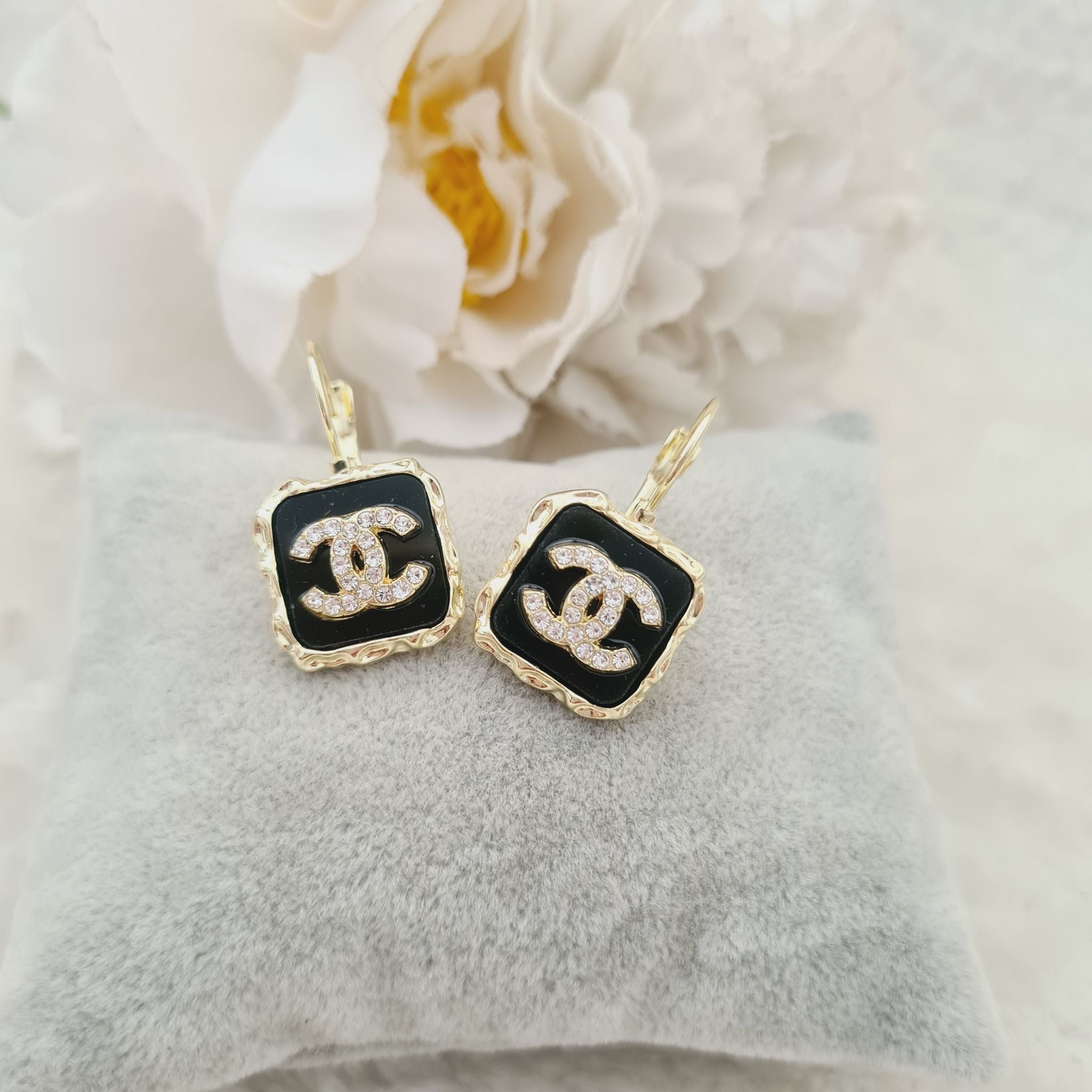 Black and crystal studded earrings