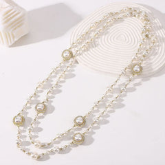 Classic Pearly Necklace with Sparkling Details in Ivory EUR462