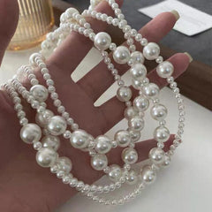 Classic Long Pearly Necklace in Ivory EUR460