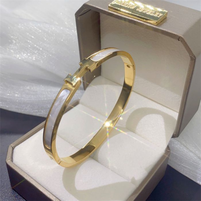 Letter H bangle in Gold