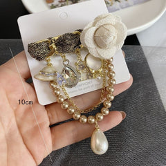 Delicate Flower and Charms Brooch in Cream 1573